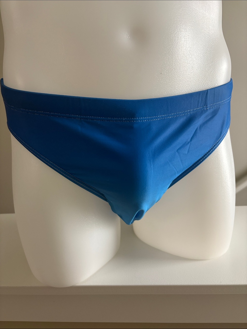 Men's Solid Blue Swim Briefs – Streamlined Performance